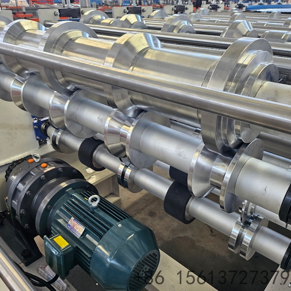Hydraulic power station of double-layer cold roll former for trapezoidal roof tile, providing consistent cutting force.