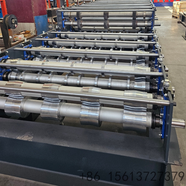 Double-layer roll forming equipment showing the precise lamination process.