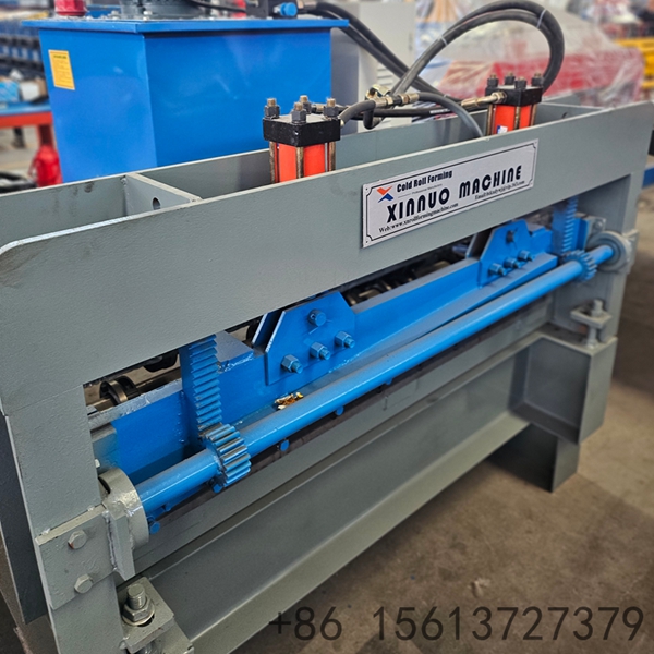 Automated roll forming line setup showing the decoiler and leveling mechanism for steel coils.
