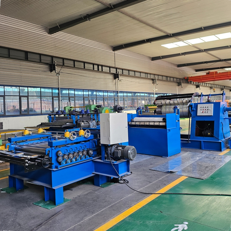 Industrial coil slitting and cutting line processing steel strips in a modern factory workshop.