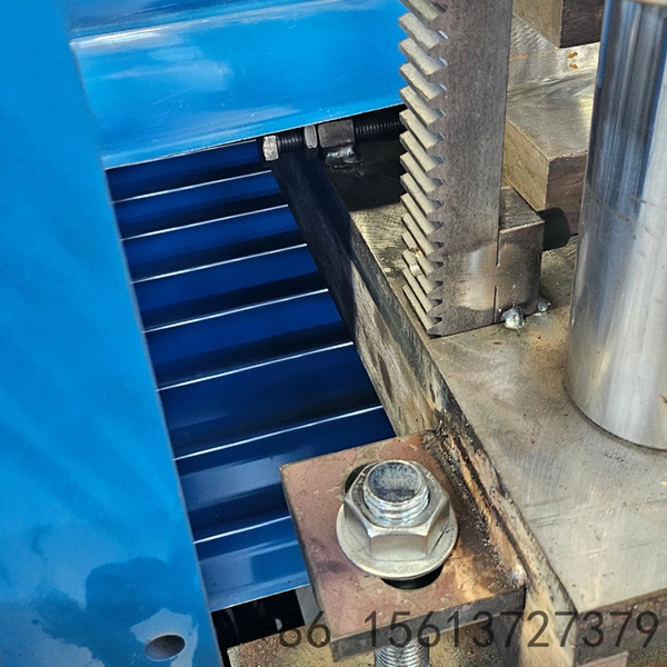Automated glazed tile production line showing the decoiler and PLC control panel.