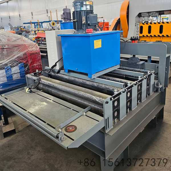 Heavy-duty metal sheet processing equipment featuring multiple rollers and a control panel box.