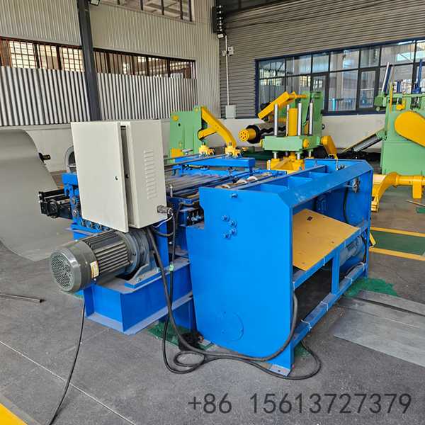 Automated steel coil processing line showing the uncoiler and feeding mechanism.