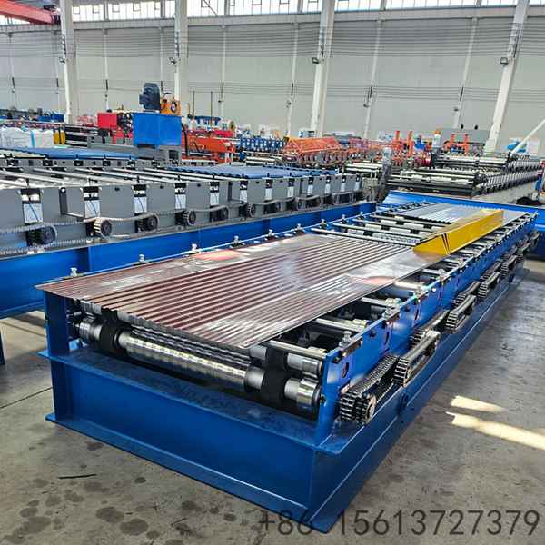 Wide-angle view of a large-scale steel roofing roll forming machine setup.