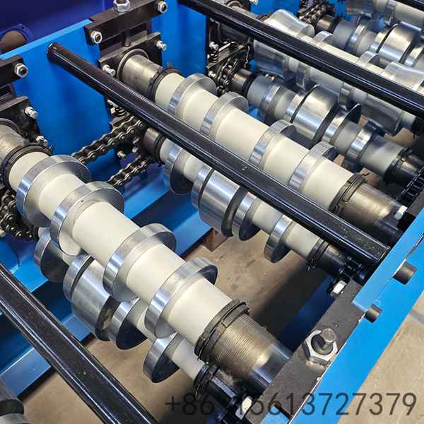 Modern metalworking station equipped with a digital display screen and electrical control cabinets.