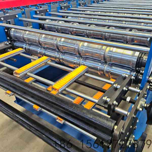 Heavy-duty metal roofing machine featuring dual-layer forming rollers and hydraulic cutting system.