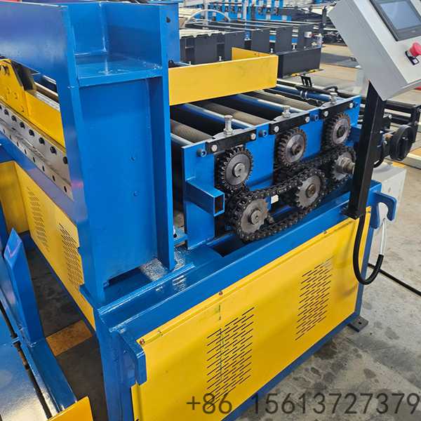 Industrial uncoiling and shearing production line processing metal coils in a modern factory.