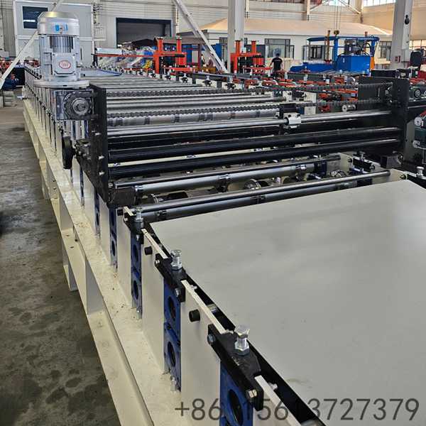 Heavy-duty welded steel frame of double-layer cold roll former for trapezoidal roof tile, ensuring stability during high-speed operation.