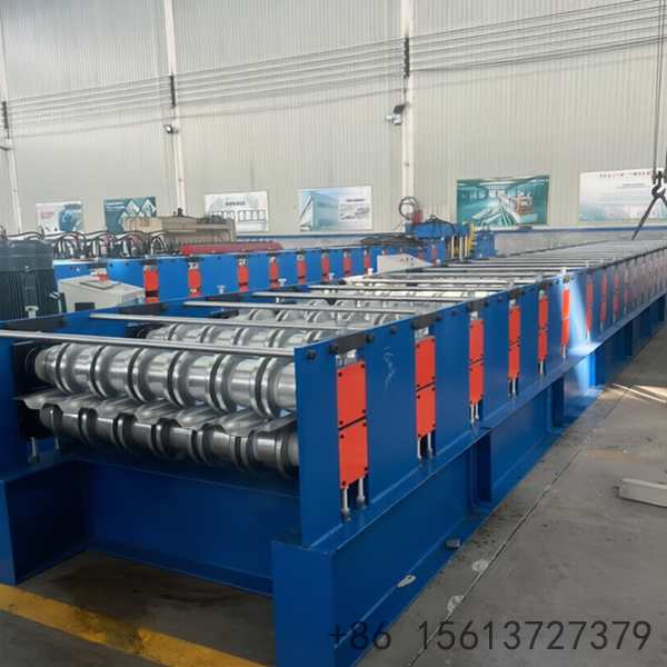 Large-scale metal sheet profiler machine shaping galvanized steel into structural carriage boards for logistics trucks.