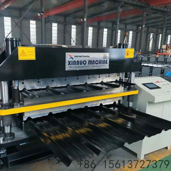 Professional double layer steel tile forming equipment demonstrating the transformation of flat metal coils into multi-peak roofing sheets.