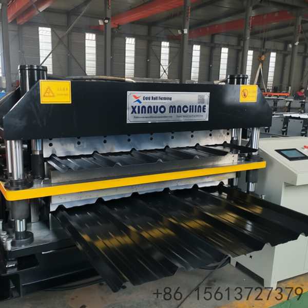 Industrial double layer steel tile making machine processing color steel coils into multi-peak corrugated roofing sheets.