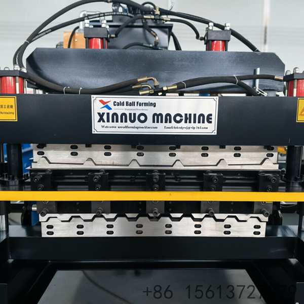 Heavy-duty dual-deck metal roofing roll forming equipment featuring automatic hydraulic cutting and precision roller stations.