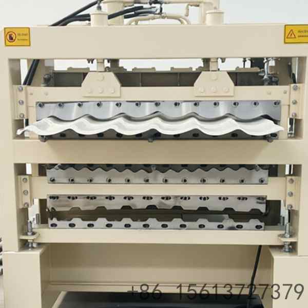Industrial triple-layer roof tile roll forming machine processing color steel coils into multi-deck corrugated roofing sheets.