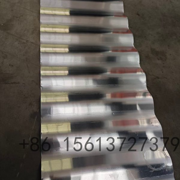 Modern corrugated roof panel maker with digital PLC control panel ensuring accurate dimensions for steel roofing sheets.