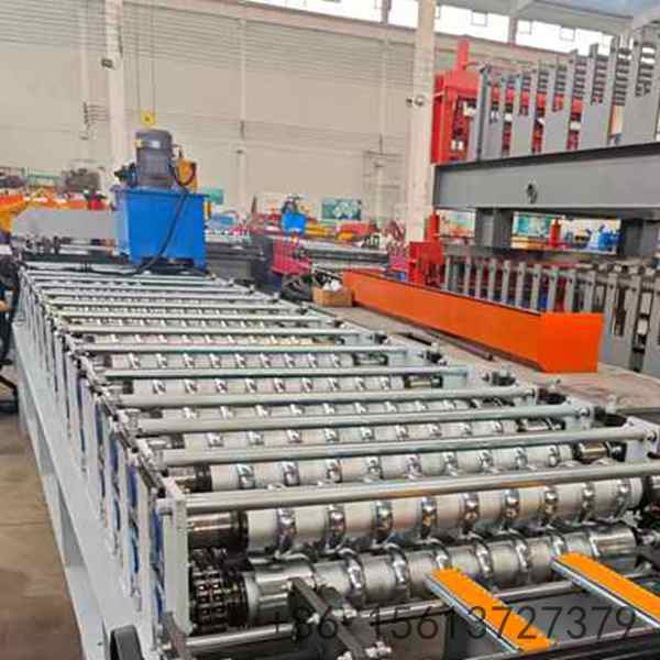 Automated metal roofing roll forming line producing high-strength corrugated steel sheets for large-scale warehouse and factory construction.