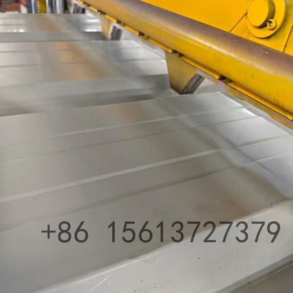 Automatic metal sheet camber bending machine featuring a robust blue steel frame and multiple precision rollers for smooth arc forming.