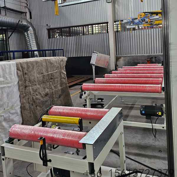 Fully automatic panel stacking machine integrated at the end of a metal roof roll forming production line