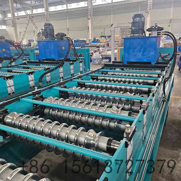Automatic corrugated steel roofing sheet roll forming machine designed for continuous metal roof panel production