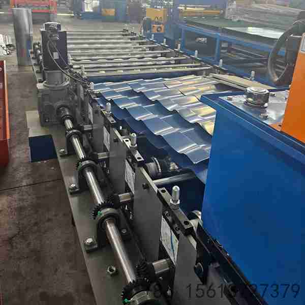 Precision roll forming station with multiple roller stations ensuring accurate color steel tile profile shaping