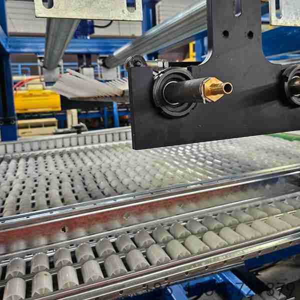 Precision roll forming station with multiple roller stations ensuring accurate steel sheet profile shaping