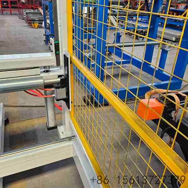 Fully automated packaging system wrapping finished composite panels securely for safe transport and storage