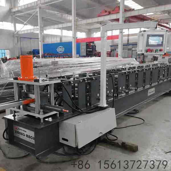 Heavy-duty CU purlin roll forming machine with high-precision roller stations for industrial steel framing.