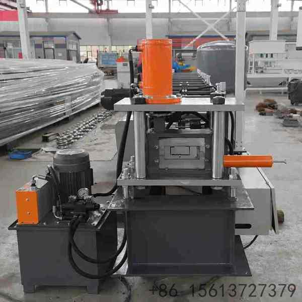 Hydraulic post-cutting unit for CU purlin machine ensuring clean and burr-free profile edges.