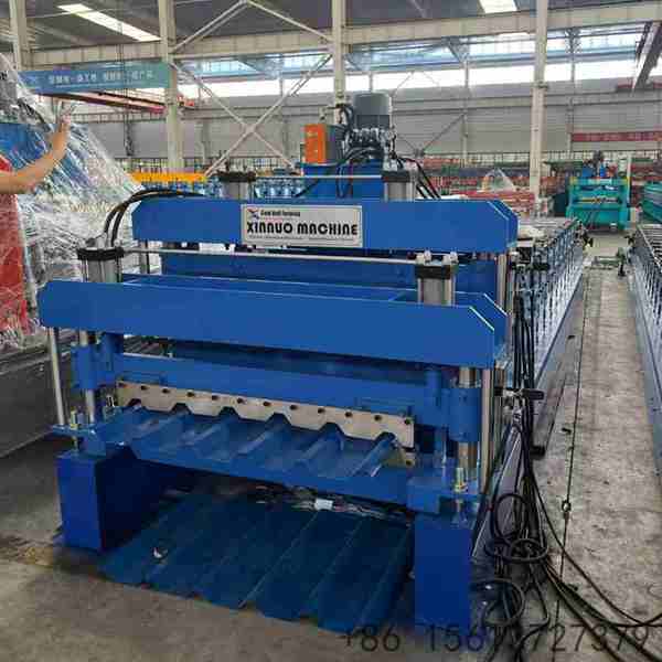 Dual-profile roll forming machine designed to manufacture two distinct metal roofing panels on a single integrated frame