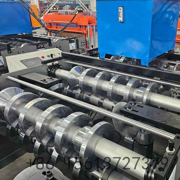 Precision roll forming station shaping the 686 IBR profile with multiple high-grade forged rollers