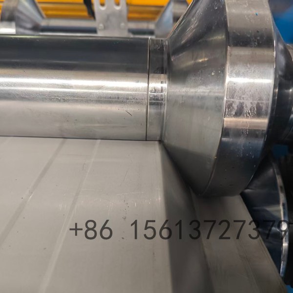 Industrial arch camber curving roll forming machine processing metal steel coils into precise curved panels for construction roofing applications.