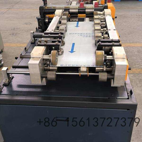 Automated concealed fastener metal roofing machine for producing standing seam panels