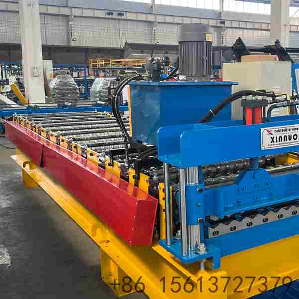 Precision roll forming station shaping the 850 corrugated profile with multiple high-grade forged rollers