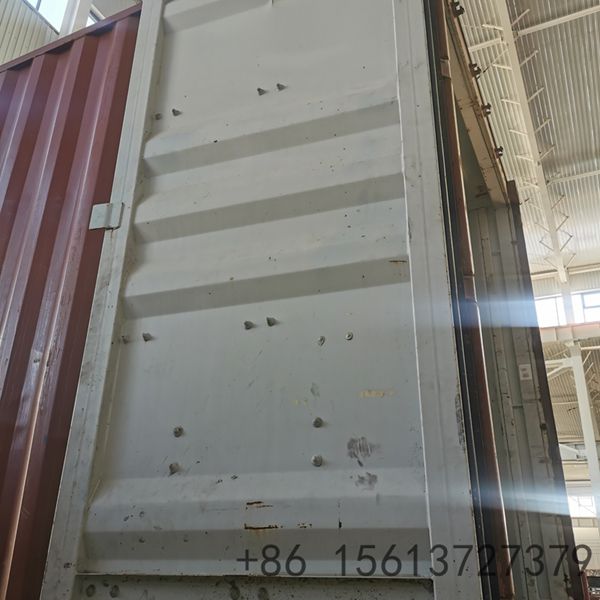 Automated decoiler and feeding guide system ensuring smooth material entry into the container panel former