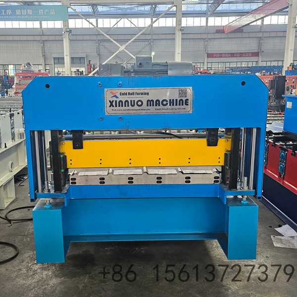 Reinforced steel base frame providing exceptional stability during continuous IBR sheeting operation