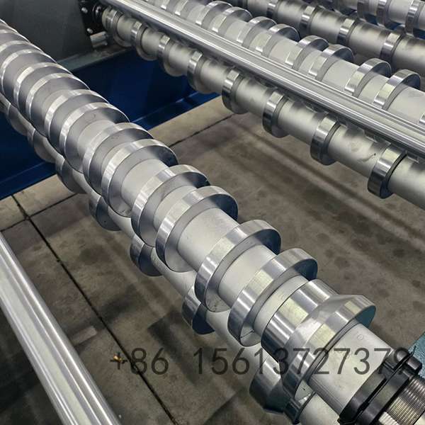 Automated decoiler and feeding guide system ensuring smooth material entry into the IBR roll former