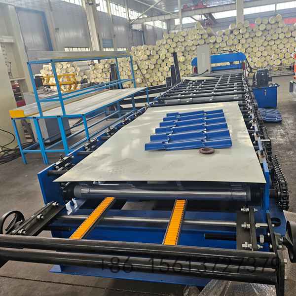 Reinforced steel base frame providing exceptional stability during continuous sheet panel forming operation