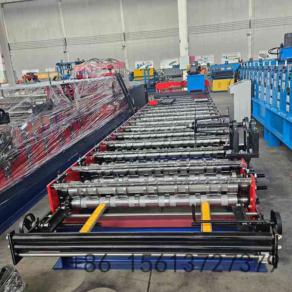Automated decoiler and feeding guide system ensuring smooth material entry into the trapezoidal former