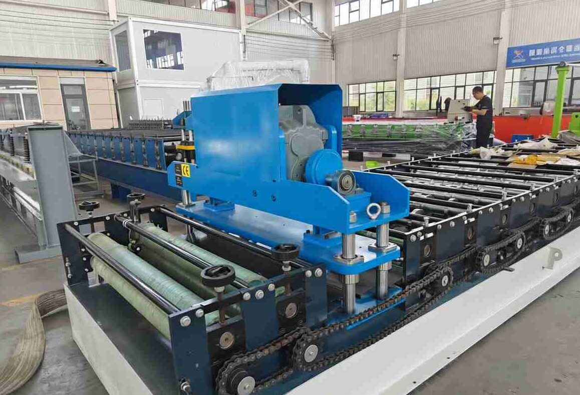 Reinforced steel base frame providing exceptional stability during continuous trapezoidal panel forming