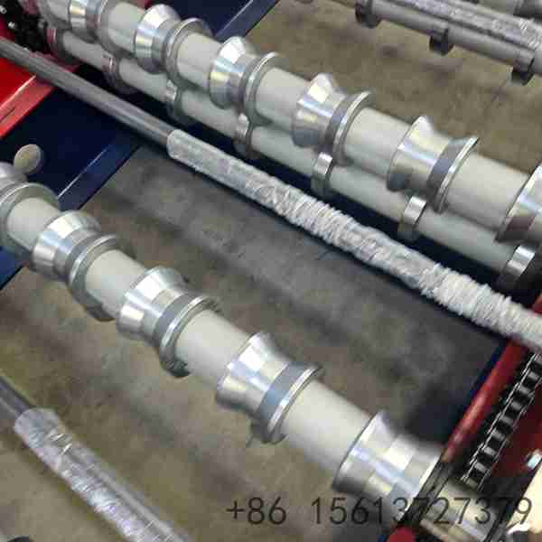 Close-up-of-precision-engineered-chrome-plated-rollers-on-trapezoidal-forming-machine-ensuring-scratch-free-surface-finish