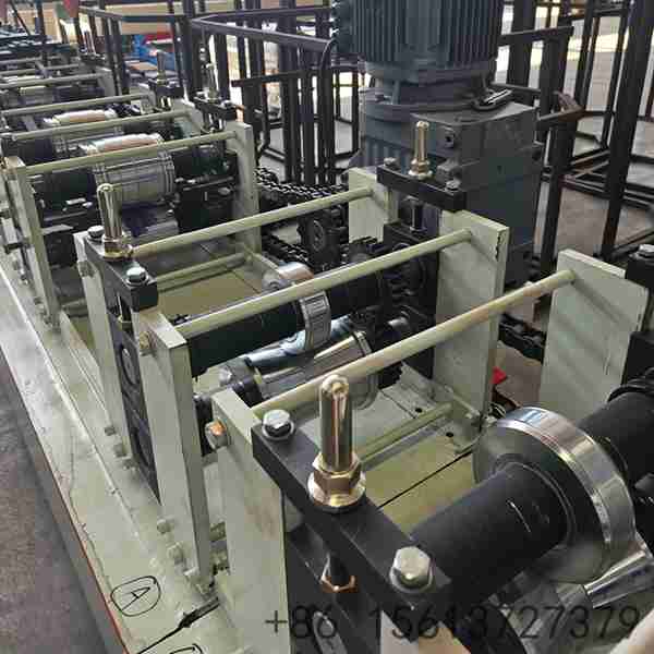 Industrial-solar-panel-mounting-bracket-profile-making-machine-showing-precision-rollers-and-base