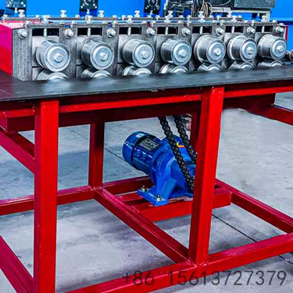 Blue-motor-and-chain-drive-system-under-edging-machine-table