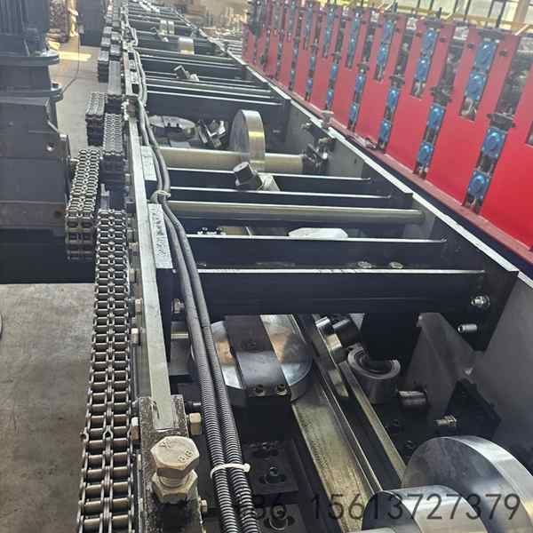 Valley gutter roll forming machine overview on the factory floor with the full line set up for a V shaped roof valley gutter