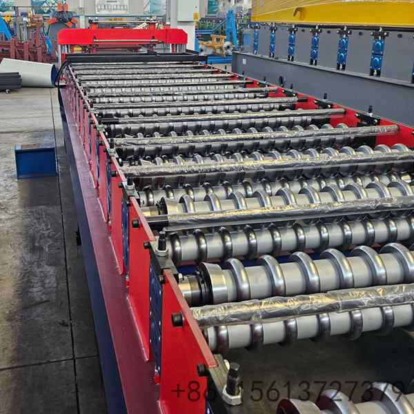 Sine wave roof sheet roll forming machine overview on the factory floor with the full line set up for an eight wave arc panel