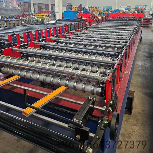 Forming rollers and 85mm shafts inside the sine wave roof sheet roll forming machine